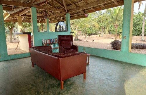 Comoe House | Round bungalow kitchenette on Lionsrest - on the West African Atlantic coast