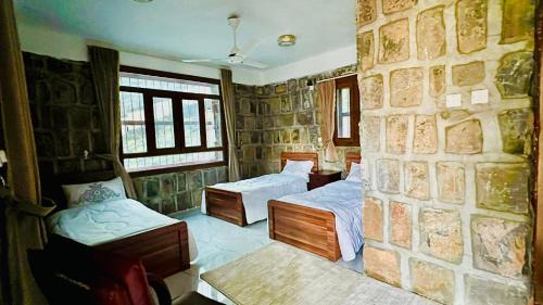 Wadi Bani Kharus Hotel | بيوت الضيافه