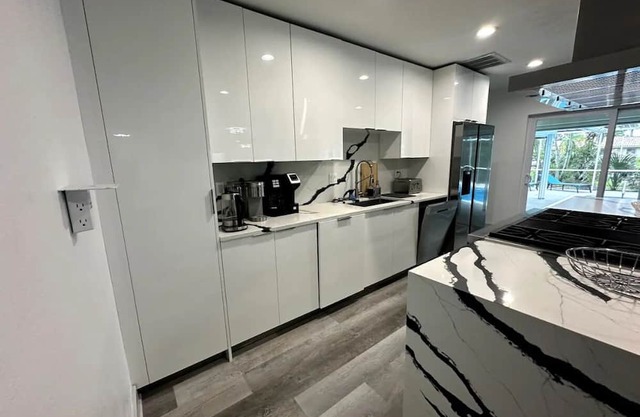 Luxurious Home in Cape Coral's Yacht Club neighborhood, minutes to open water.
