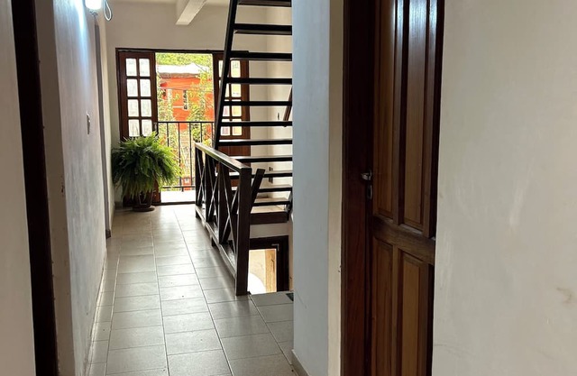 Centrally located room with living room and full kitchen-2C