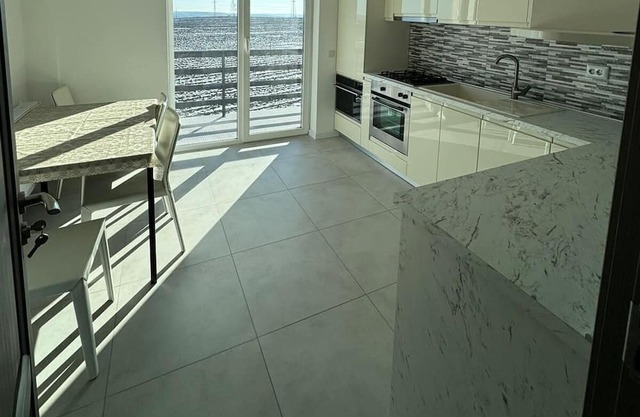 Brand new, quiet apartment close to city center and with a beautiful sunrise