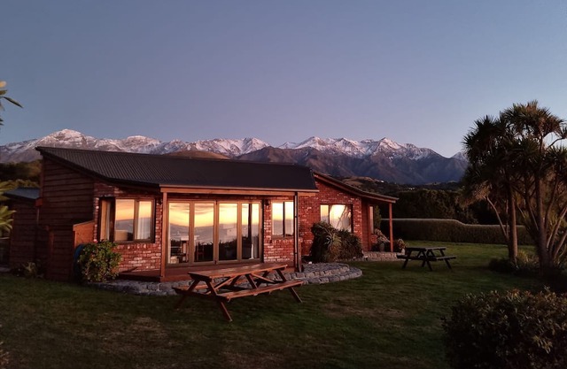 Unwind and rejuvenate amidst the scenery of the ocean and snow-capped mountains.