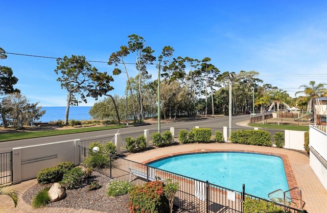 Bright Coastal Stay with Pool and Beach View