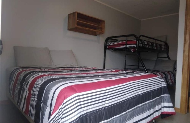 Charming remodeled motel room in Hemphill with Wi-Fi, mini fridge & microwave.