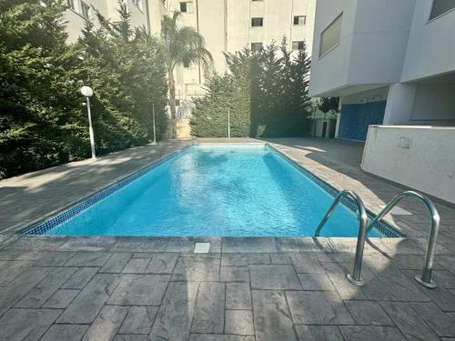 Sophisticated 2BR with Pool & Terrace Views