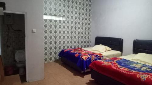 homestay ghuzy home syariah