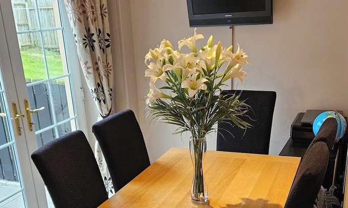 Newcastle House | Semi detached home with garage. 3 bedrooms, 3 bathrooms. Treadmill in garage.