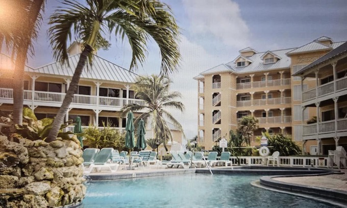 Colliers Bay Condo | Morritt's Tortuga Club :Three pools , lovely beach and pier. 2Bd/2Bth.