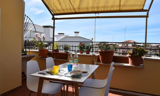 Anzio Apartment | Penthouse overlooking the rooftops of Anzio's historic buildings, downtown but within walking distance of the beach.