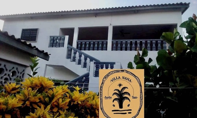 Aneho Villa | Room with lounge and garden near the beach in Aneho. Quiet neighborhood.