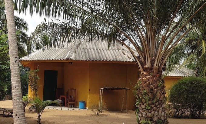 Comoe House | Round bungalow kitchenette on Lionsrest - on the West African Atlantic coast