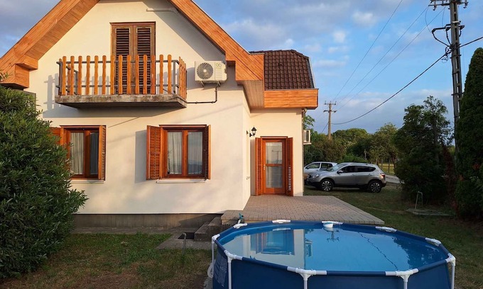 Balatonkiliti House | Holiday home with pool, lake view, terrace and panorama in Weinberg